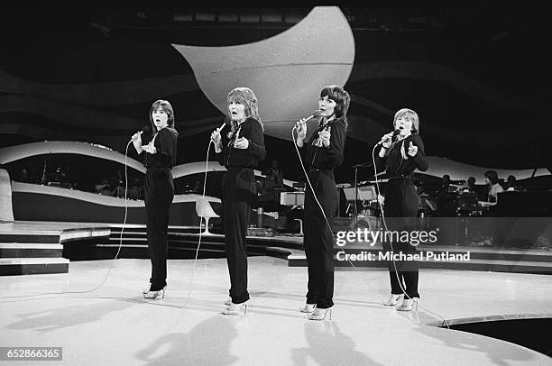 Anglo-Irish vocal group The Nolans performing on a TV show, 1981. Left to right: Coleen Nolan, Linda Nolan, Maureen Nolan and Bernie Nolan .
