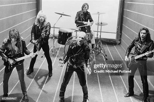 British heavy metal band Judas Priest during the video shoot for their single 'Don't Go', January 1981. Left to right: Glenn Tipton, K. K. Downing,...