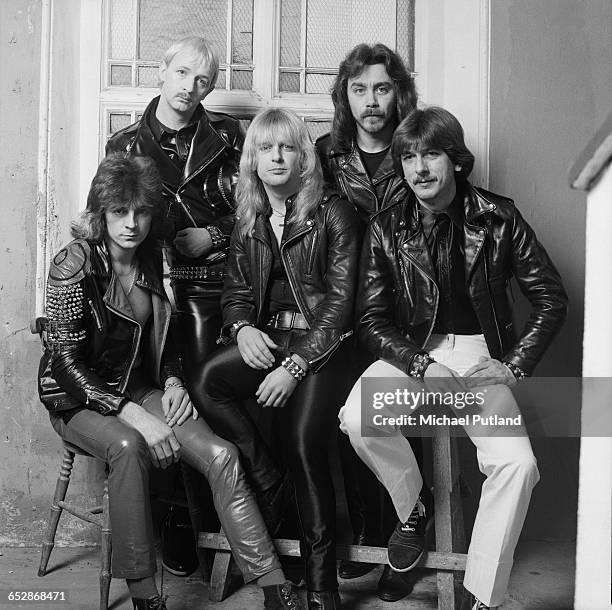 British heavy metal band Judas Priest on the set of the video shoot for their single 'Don't Go', January 1981. Left to right: guitarist Glenn Tipton,...