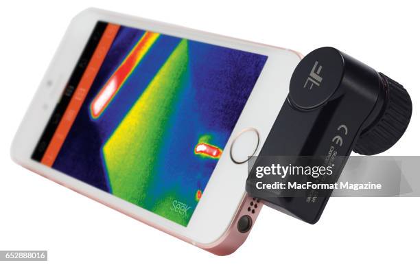 An Apple iPhone SE with a Rose Gold finish fitted with a Seek CompactPro thermal imaging camera, taken on September 1, 2016.