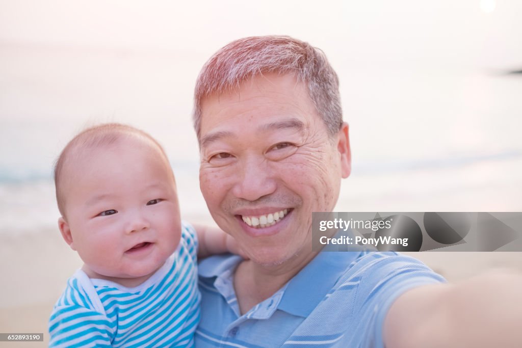 Old man selfie with grandson
