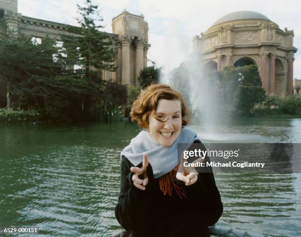 woman gesturing near fountain - palace of fine arts stock pictures, royalty-free photos & images