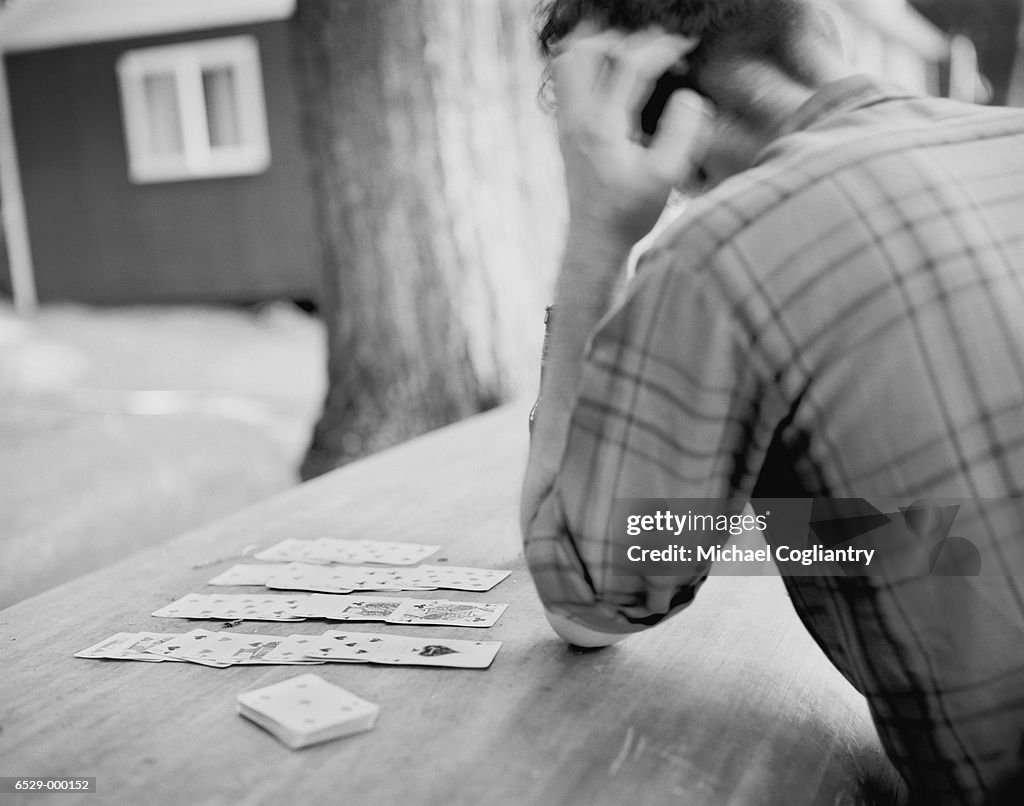 Man Playing Solitaire High-Res Stock Photo - Getty Images