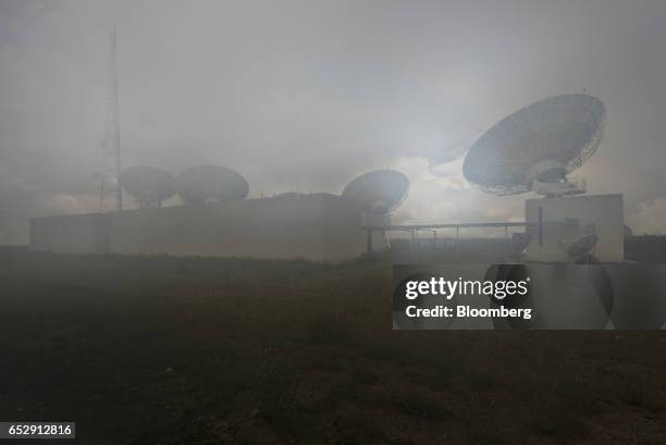 Fog passes in front of the Bolivian Space Agency Amachuma Ground Station in Achocalla, La Paz Department, Bolivia, on Wednesday, March 1, 2017....