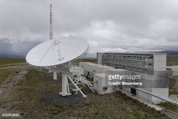 Satellite antenna stands in front of the Bolivian Space Agency Amachuma Ground Station in Achocalla, La Paz Department, Bolivia, on Wednesday, March...