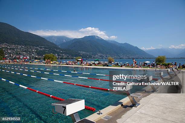 people at outdoor swimming pool, lido locarno, locarno, ticino, switzerland - swimming lane marker bildbanksfoton och bilder