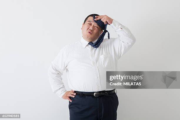 middle-aged of japanese man wearing a suit - businessman in suit ストックフォトと画像