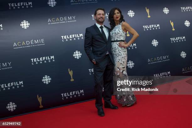 Jason Priestly and Cindy Sampson. Canadian Screen Awards red carpet at Sony Centre for the Performing Arts ahead of the show.