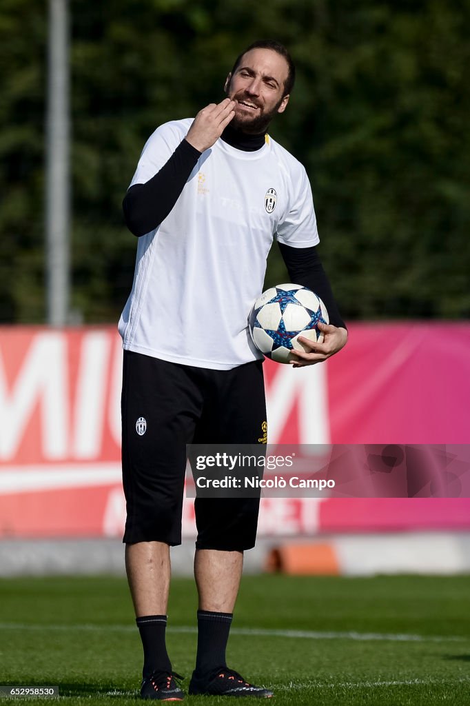 Gonzalo Higuain gestures during the Juventus FC training on...