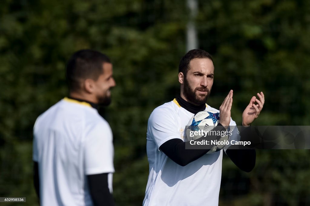 Gonzalo Higuain (right) gestures during the Juventus FC...