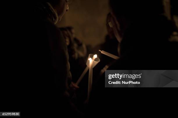 Vigil in memoriam of homeless burned two days ago in Santa Maria della Pace dei Frati Minori Cappuccinis Church in Palermo on March 12, 2017