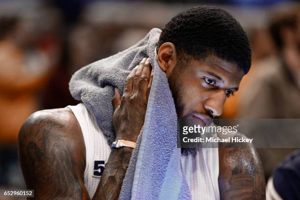 Paul George of the Indiana Pacers is seen on the bench during a timeout against the Detroit Pistons at Bankers Life Fieldhouse on March 8, 2017 in...