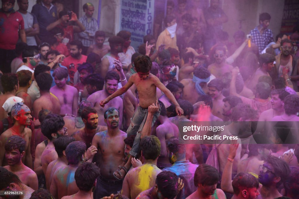 Tourist celebrate the Holi cloth tearing (Kapda Phad), the...