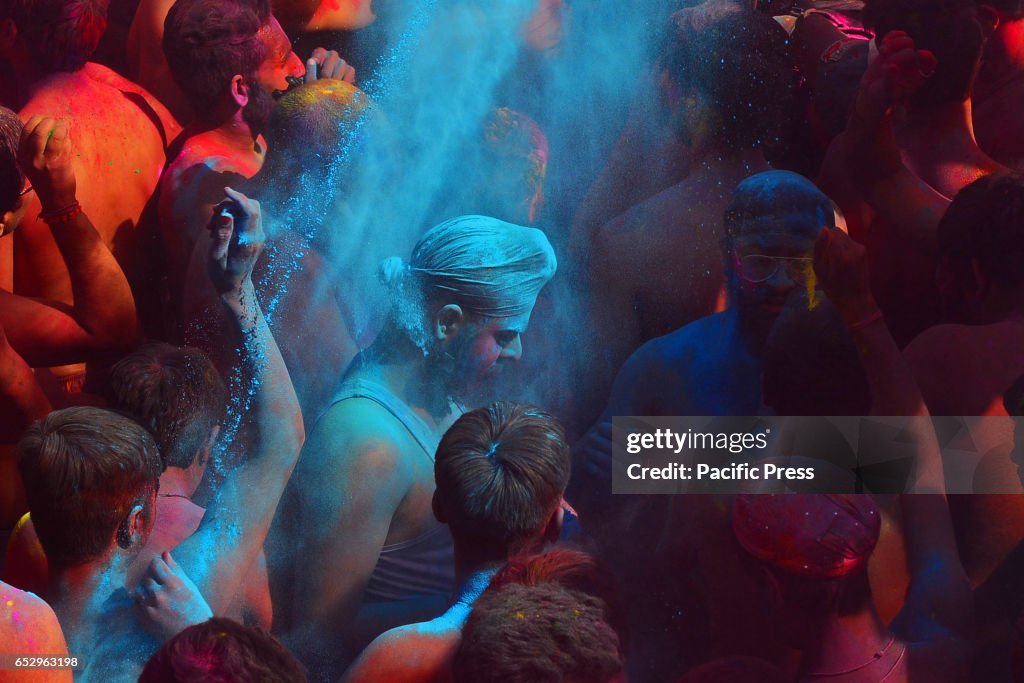 Tourist celebrate the Holi cloth tearing (Kapda Phad), the...