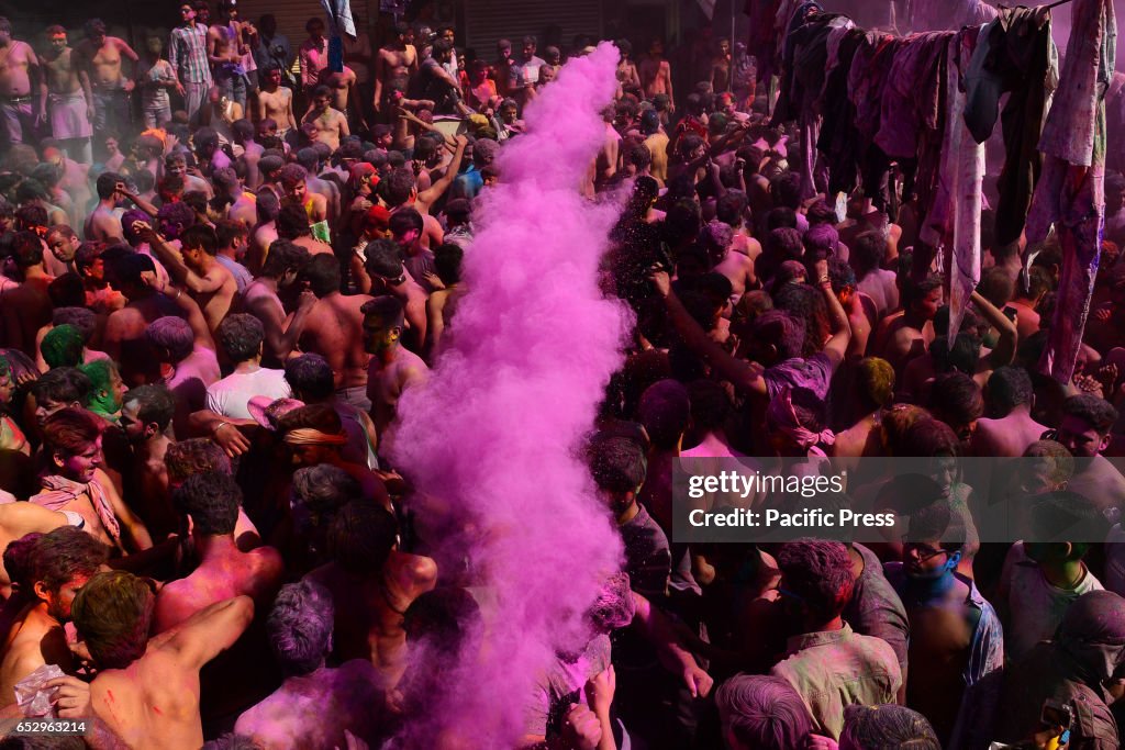 Tourist celebrate the Holi cloth tearing (Kapda Phad), the...