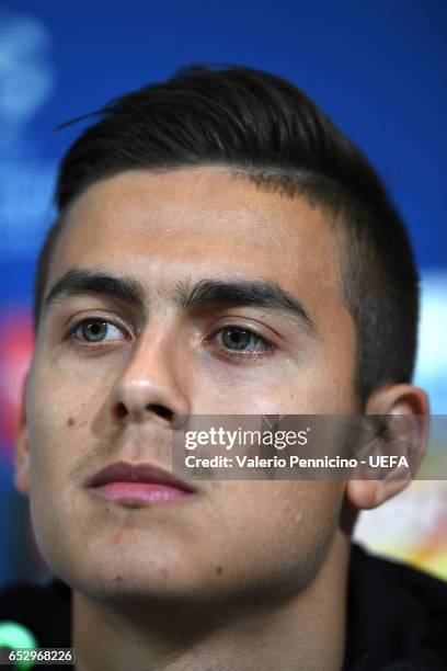 Paulo Dybala of Juventus FC faces the media during a press conference ahead of the UEFA Champions League Round of 16 second leg match between...