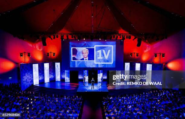 Netherlands' far-right politician Geert Wilders of the PVV party and Netherlands' prime minister Mark Rutte of the VVD Liberal party debate onstage...