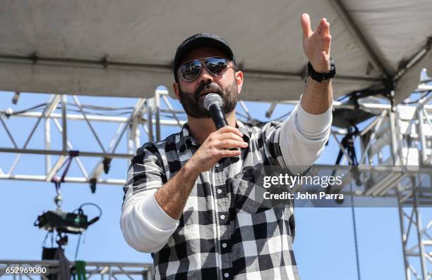 Enrique Santos backstage during the iHeartLatino TU94.9FM Calle Ocho festival on March 12, 2017 in Miami, Florida.