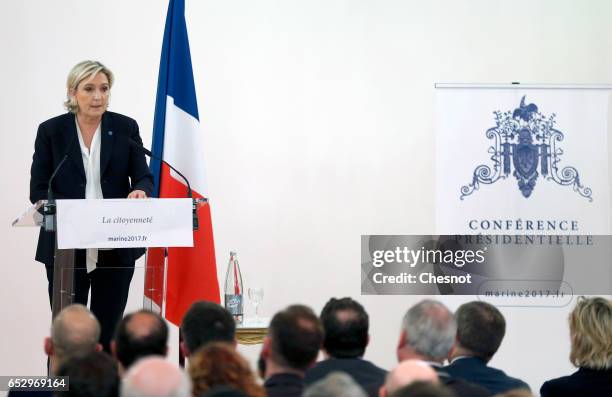 French far-right political party National Front President, Marine Le Pen delivers a speech focused on the theme "Citizenship" during a press...