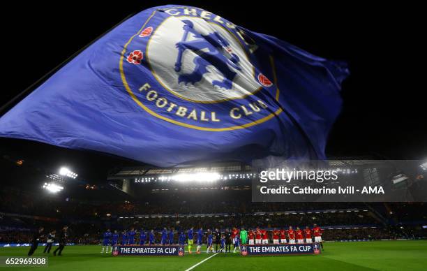 The Chelsea flag is flown as the teams line up during The Emirates FA Cup Quarter-Final match between Chelsea and Manchester United at Stamford...