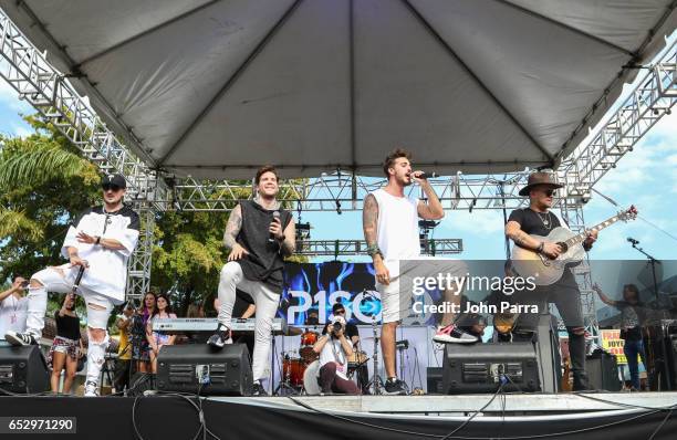 Juan David M. Castano, Juan David Huertas Clavijo, Pablo Mejia Bermudez and David Escobar Gallego of Piso 21 perform on stgae during the iHeartLatino...