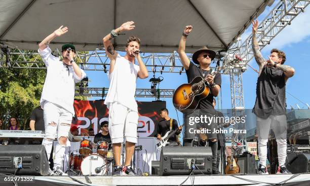 Juan David M. Castano, Juan David Huertas Clavijo, Pablo Mejia Bermudez and David Escobar Gallego of Piso 21 perform on stgae during the iHeartLatino...