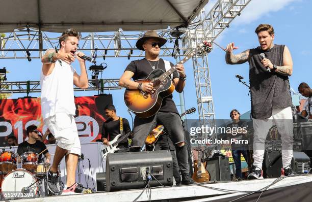 Juan David M. Castano, Juan David Huertas Clavijo, Pablo Mejia Bermudez and David Escobar Gallego of Piso 21 perform on stgae during the iHeartLatino...