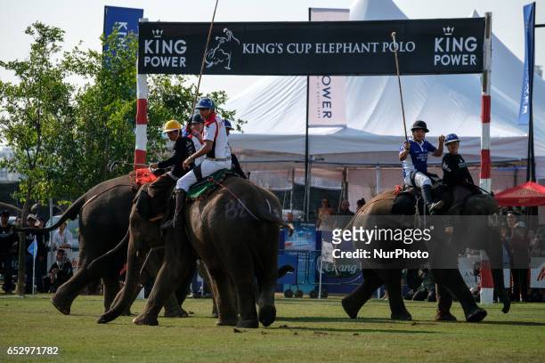 Polo players ride elephants during the 2017 King's Cup Elephant Polo tournament at Anantara Chaopraya Resort in Bangkok, Thailand on March 12, 2017....