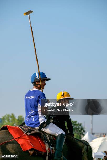 Polo player rides an elephant during the 2017 King's Cup Elephant Polo tournament at Anantara Chaopraya Resort in Bangkok, Thailand on March 12,...