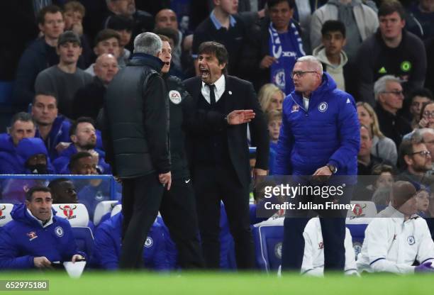 Fourth official Mike Jones intervenes as Jose Mourinho manager of Manchester United and Antonio Conte manager of Chelsea clash during The Emirates FA...
