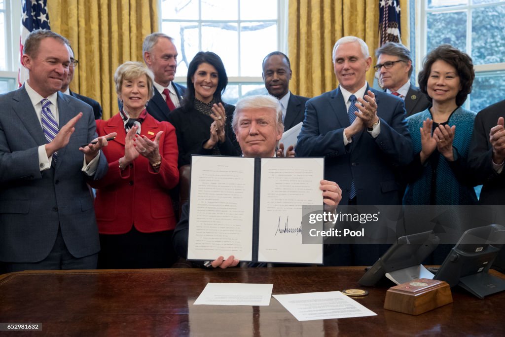 President Trump Signs Executive Order In Oval Office