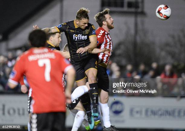 Donegal , Ireland - 13 March 2017; Paddy Barrett of Dundalk in action against Ryan McBride of Derry City during the SSE Airtricity League Premier...