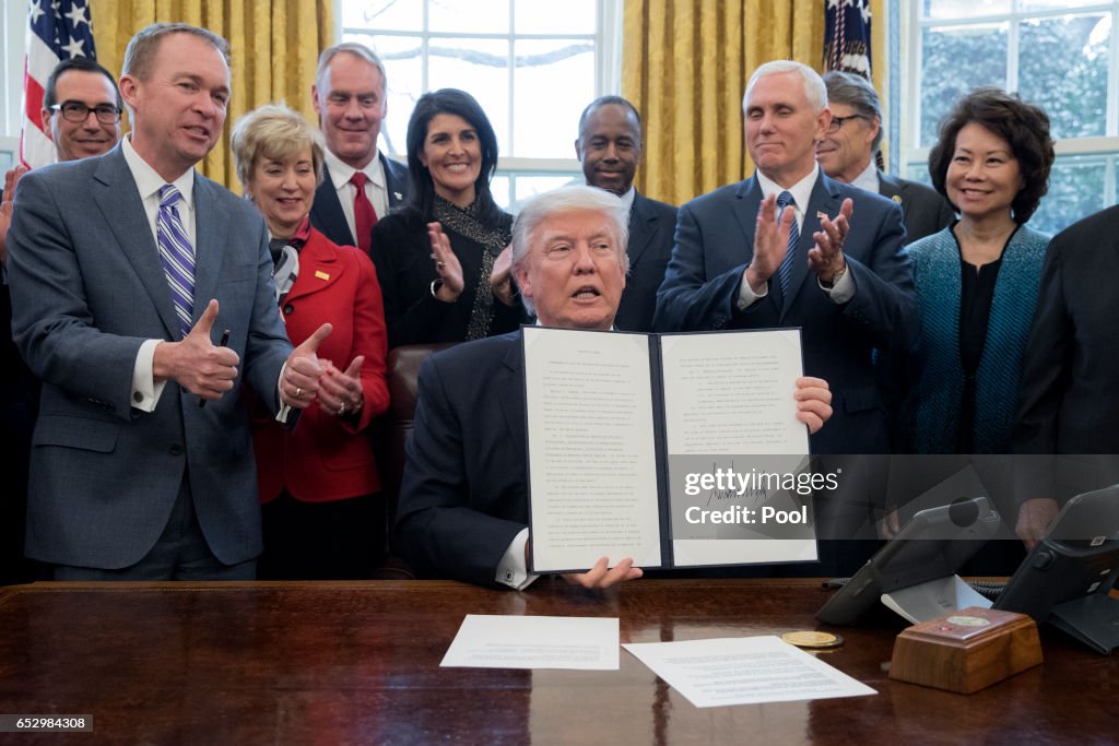 President Trump Signs Executive Order In Oval Office