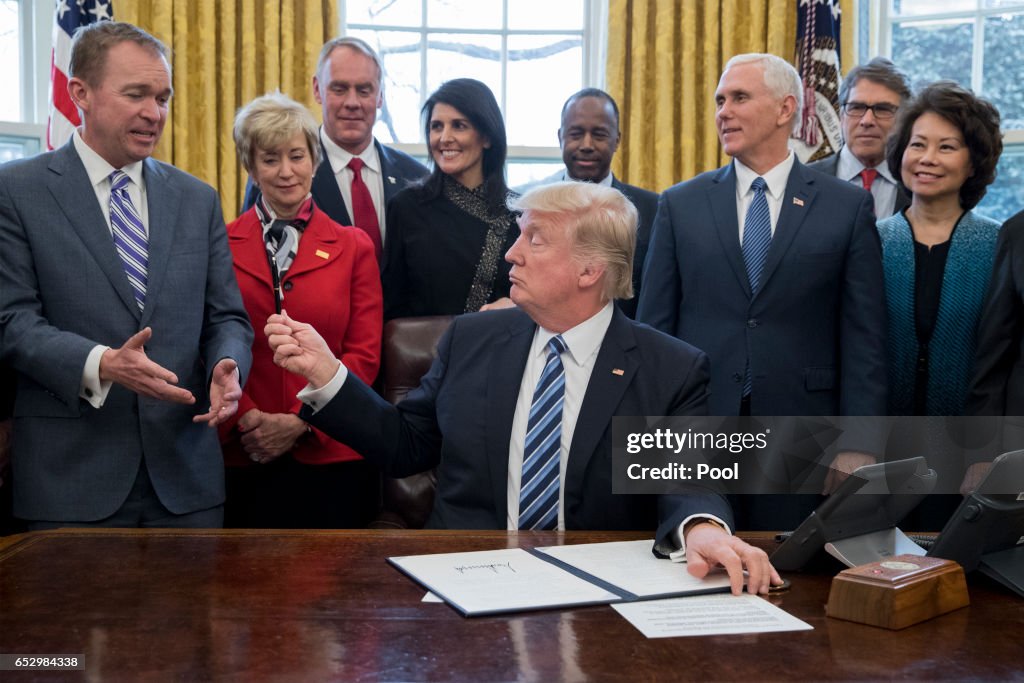 President Trump Signs Executive Order In Oval Office