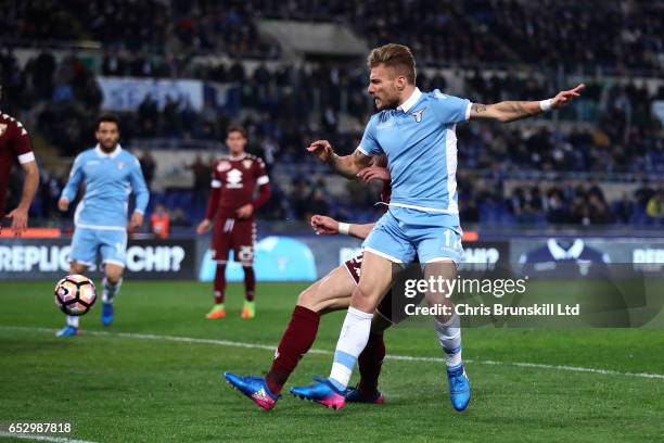 Ciro Immobile of SS Lazio scores the opening goal during the Serie A match between SS Lazio and FC Torino at Stadio Olimpico on March 13, 2017 in...