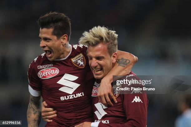 Maxi Lopez with his teammate Juan Iturbe of FC Torino celebrates after scoring the team's first goal during the Serie A match between SS Lazio and FC...