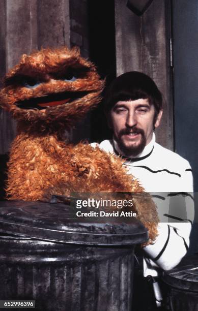 Puppeteer Caroll Spinney with Oscar the Grouch rehearses for an episode of Sesame Street at Reeves TeleTape Studio in 1970 in New York City, New York.