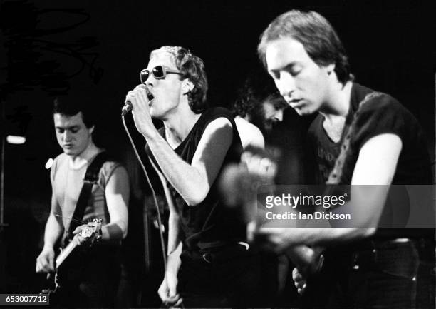 Dave Wight, Riff Regan and Steve Voice of punk band London, performing on stage in London, 1977.
