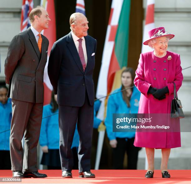 Prince Edward, Earl of Wessex, Prince Philip, Duke of Edinburgh and Queen Elizabeth II attend the launch of The Queen's Baton Relay for the XXI...