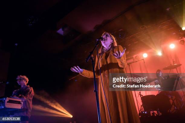 Ryan Wonsiak, singer Katie Stelmanis and Maya Postepski of Austra perform live on stage during a concert at Astra on March 13, 2017 in Berlin,...