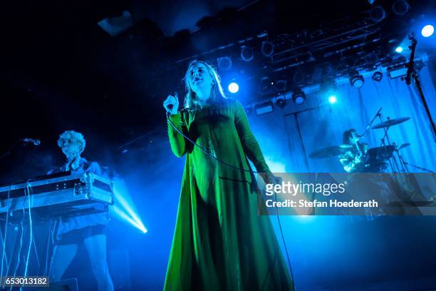 Ryan Wonsiak, singer Katie Stelmanis and Maya Postepski of Austra perform live on stage during a concert at Astra on March 13, 2017 in Berlin,...