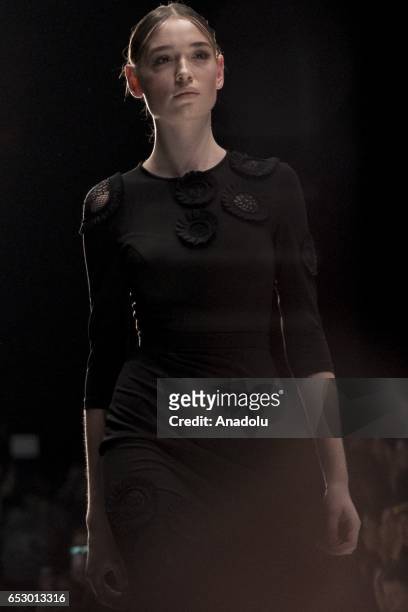 Model presents a creation by ISABEL GARCIA during the 2017/2018 Fall/Winter Mercedes-Benz Fashion Week Russia on March 13, 2017 in Moscow.