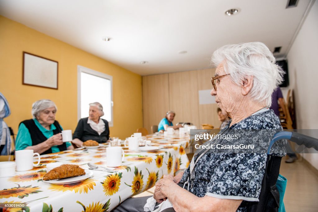 Seniors At The Retirement Home Having Breakfast