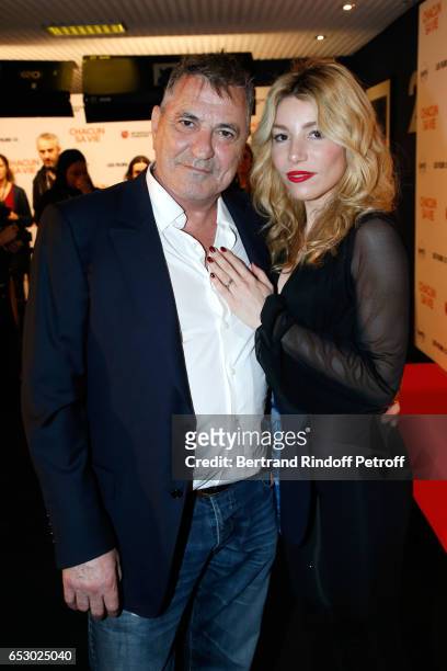Jean-Marie Bigard and his wife Lola Marois attend the "Chacun sa vie" Paris Premiere at Cinema UGC Normandie on March 13, 2017 in Paris, France.