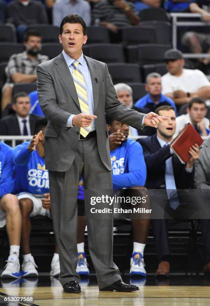 Head coach Steve Alford of the UCLA Bruins reacts during a quarterfinal game of the Pac-12 Basketball Tournament against the USC Trojans at T-Mobile...