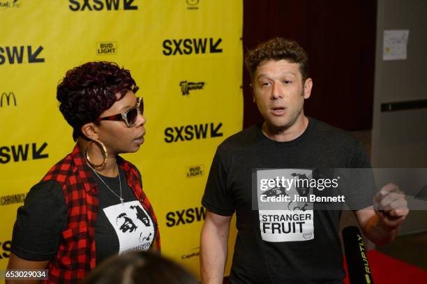Mike Brown's mother Lesley McSpadden and director Jason Pollock are interviewed at the red carpet premier of the documentary Stranger Fruit during...