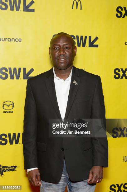 Mike Brown's attorney Benjamin Crump walks the red carpet at the SxSW Film Festival premier of Stranger Fruit at the Austin Convention Center on...