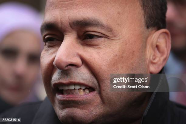 Rep. Luis Gutierrez speaks to the press after leaving the office of Immigration Services where he was briefly handcuffed and detained after refusing...