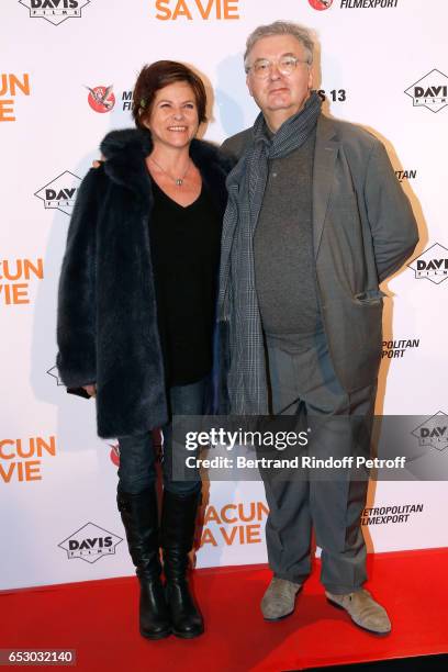 Charlotte Valandrey and Dominique Besnehard attend the "Chacun sa vie" Paris Premiere at Cinema UGC Normandie on March 13, 2017 in Paris, France.