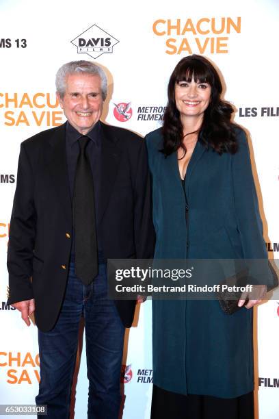 Director of the movie Claude Lelouch and Valerie Perrin attend the "Chacun sa vie" Paris Premiere at Cinema UGC Normandie on March 13, 2017 in Paris,...